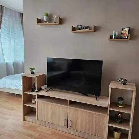 Family In Sunny Apartment
